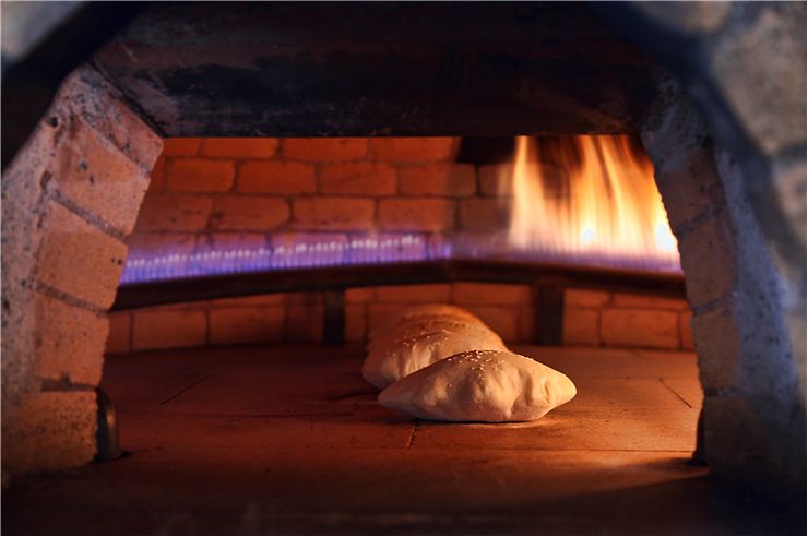 Picture - Baked Bread in Brick Oven